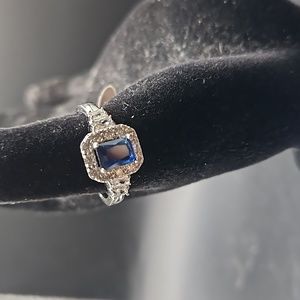 I-6 Silvertone ring with blue stone and crystal accents